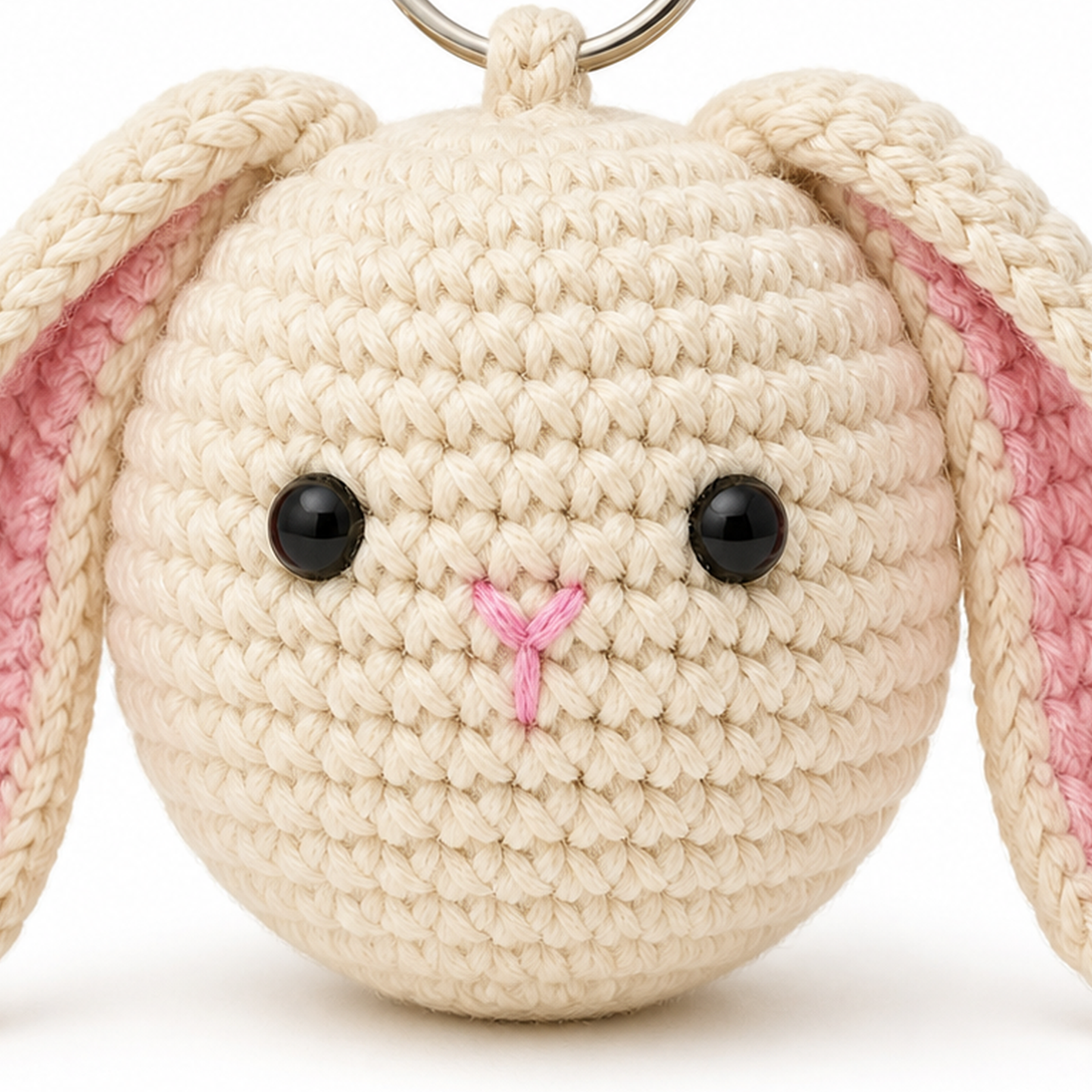 Close-up of the single crochet stitches on a mini animal charm
