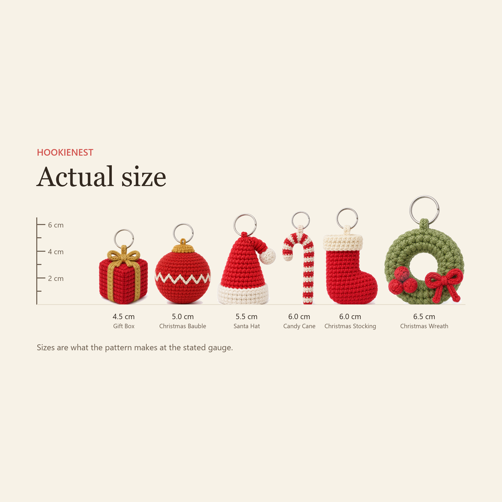 The six Christmas charms shown against a ruler at actual size