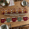 Gingerbread house and burgundy-and-sage cocoa mug crochet runners on a wooden Christmas dining table with plates, linen napkins, greenery and a candle, with the pattern title across the centre.