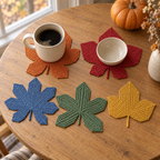 Ribbed Leaf crochet coasters on a table: Sugar Maple, Red Maple, Japanese Maple, Sweetgum, Sycamore.