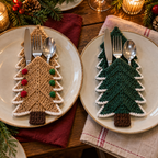 Tan Gingerbread and green Snowy Pine crochet cutlery holders with white branch edging, shown beside each other on plates.