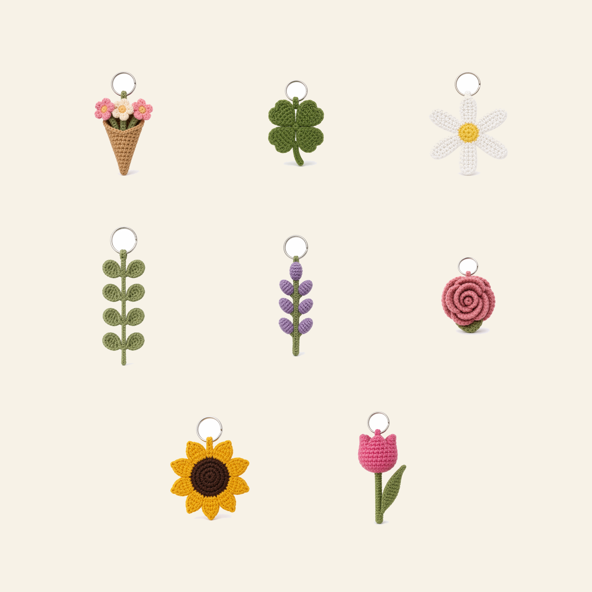 All 8 flower and leaf crochet bag charms in the set, shown together