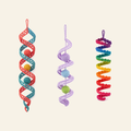 Three crochet lace wind spinners side by side: a coral and teal double helix, a lilac spiral with three balls hanging inside it, and a rainbow coil edged with scalloped shells, every band openwork