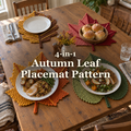 Four two-tone crochet leaf placemats set around a wooden autumn dinner table, with plates of food, an empty plate, a bowl of bread rolls and the title 4-in-1 Autumn Leaf Placemat Pattern.