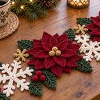 Close view of a layered burgundy crochet poinsettia, its gold yarn centre and nearby green leaves and red crochet berries on a wooden table.