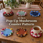 Six crochet mushroom coasters and two cups of tea on a wooden table beneath the title 21-in-1 Pop-Up Mushroom Coaster Pattern.