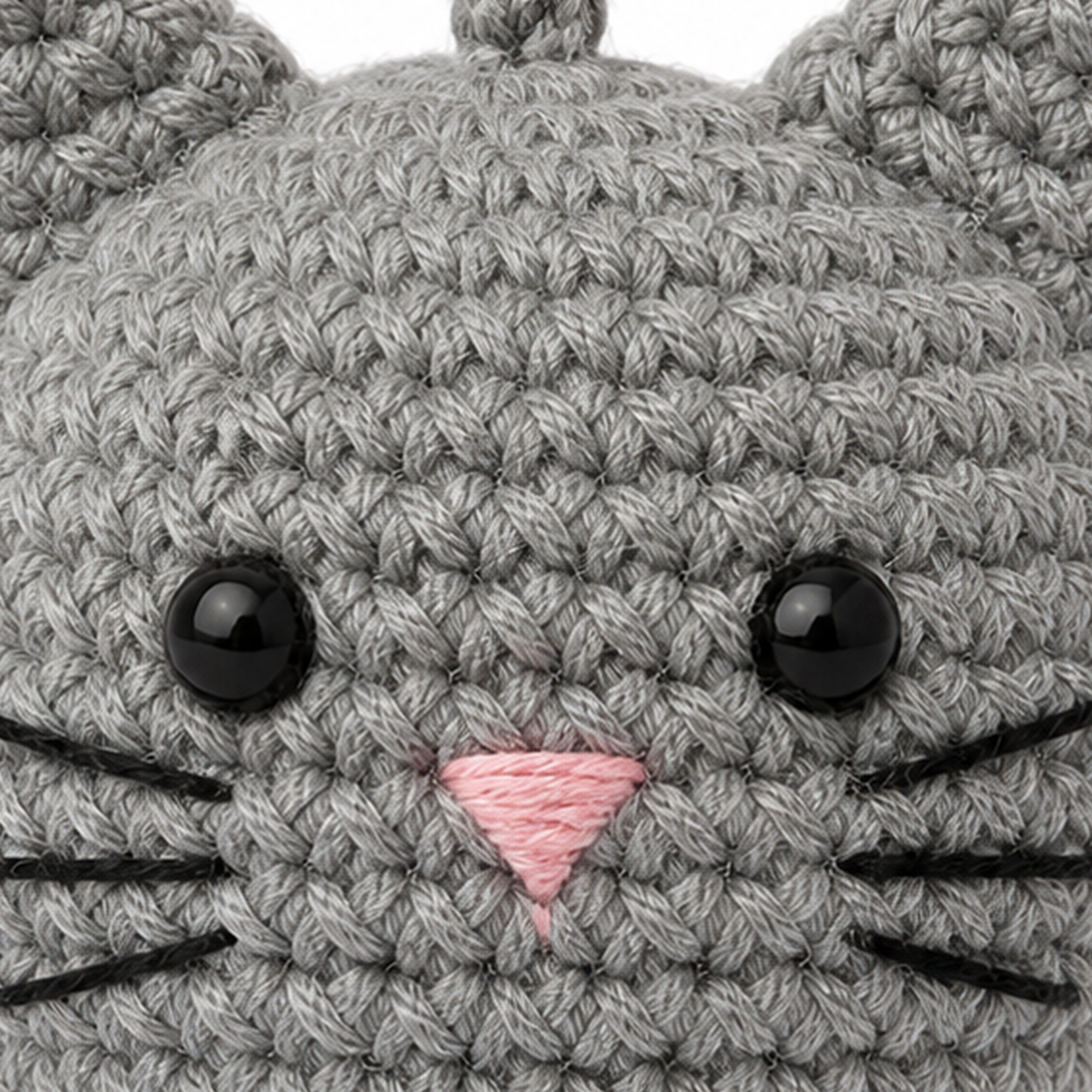 Close-up of the crochet stitches on the Cat charm