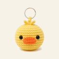 The finished crochet Duck bag charm on its own