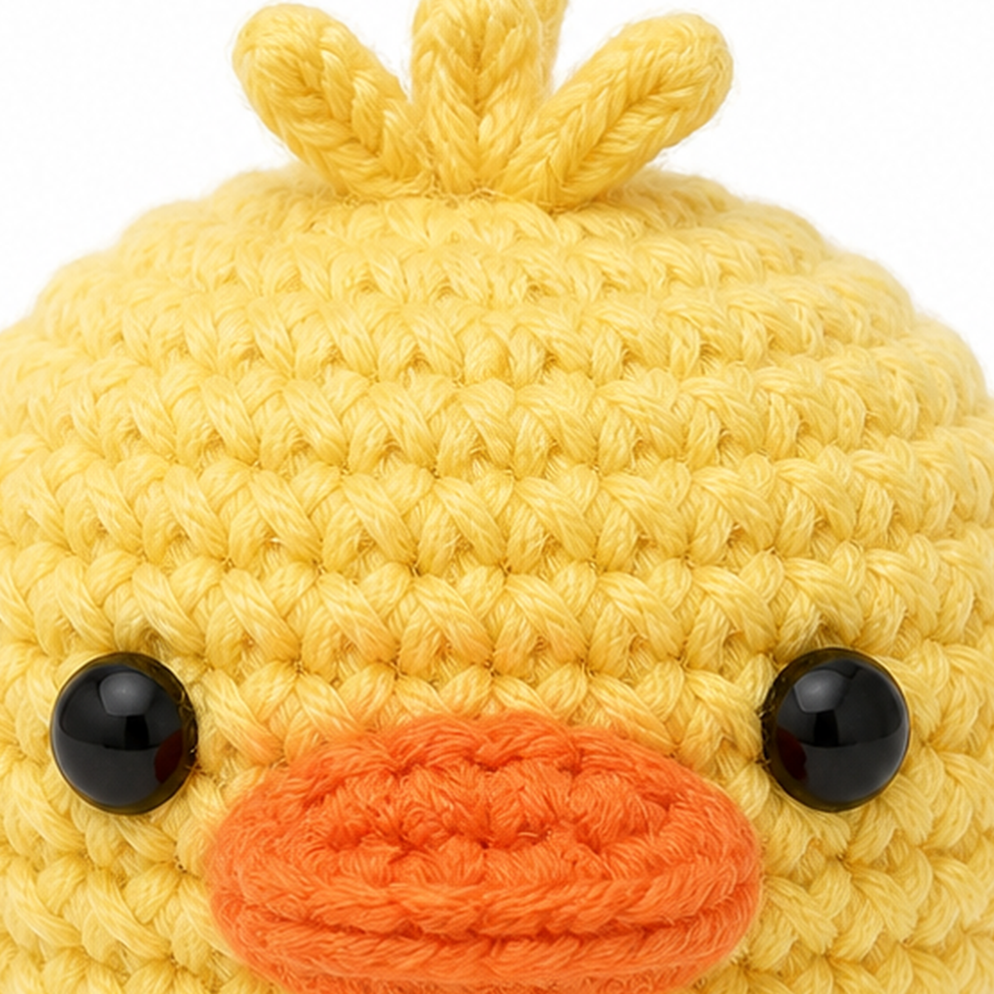 Close-up of the crochet stitches on the Duck charm