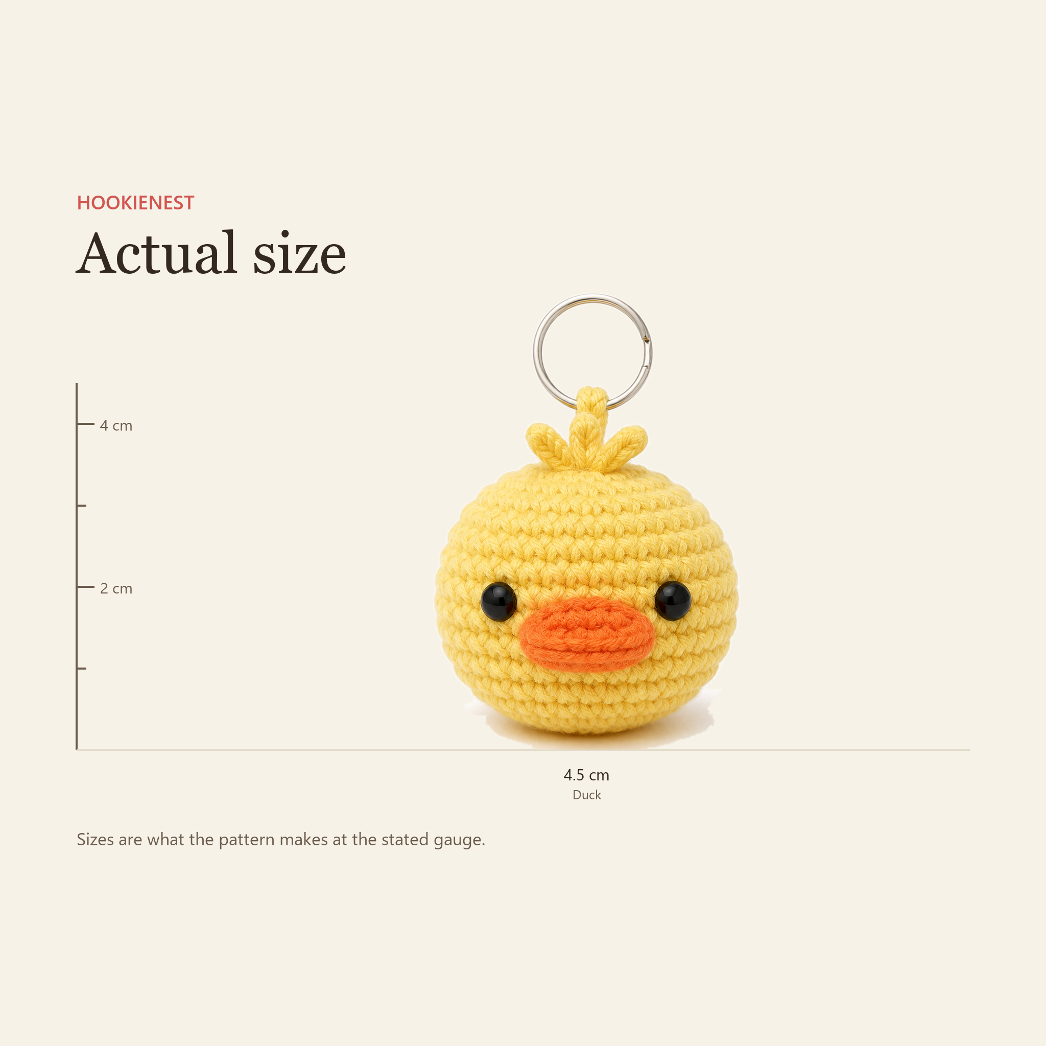 The Duck charm beside a centimetre ruler, finishing at 4.5 cm
