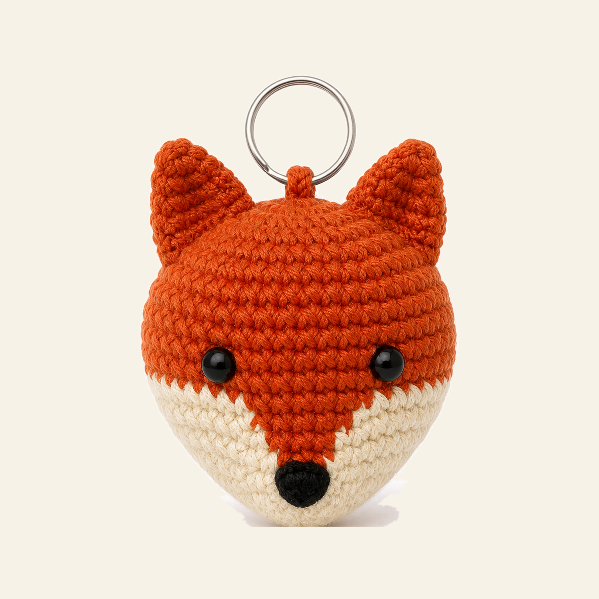 The finished crochet Fox bag charm on its own