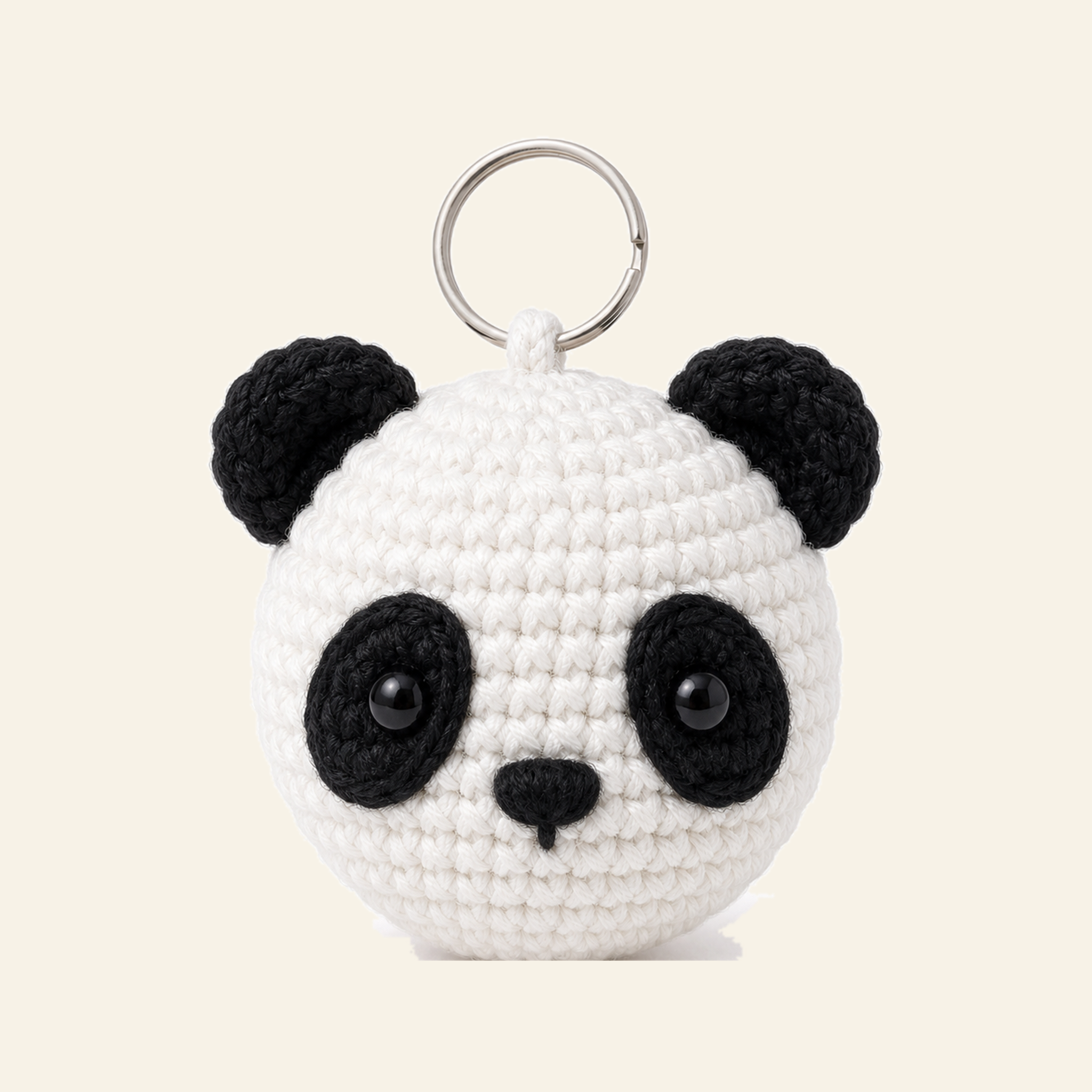 The finished crochet Panda bag charm on its own