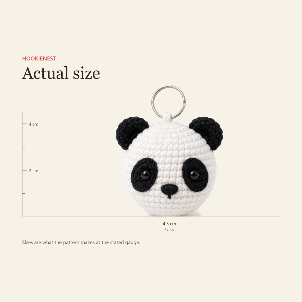 The Panda charm beside a centimetre ruler, finishing at 4.5 cm