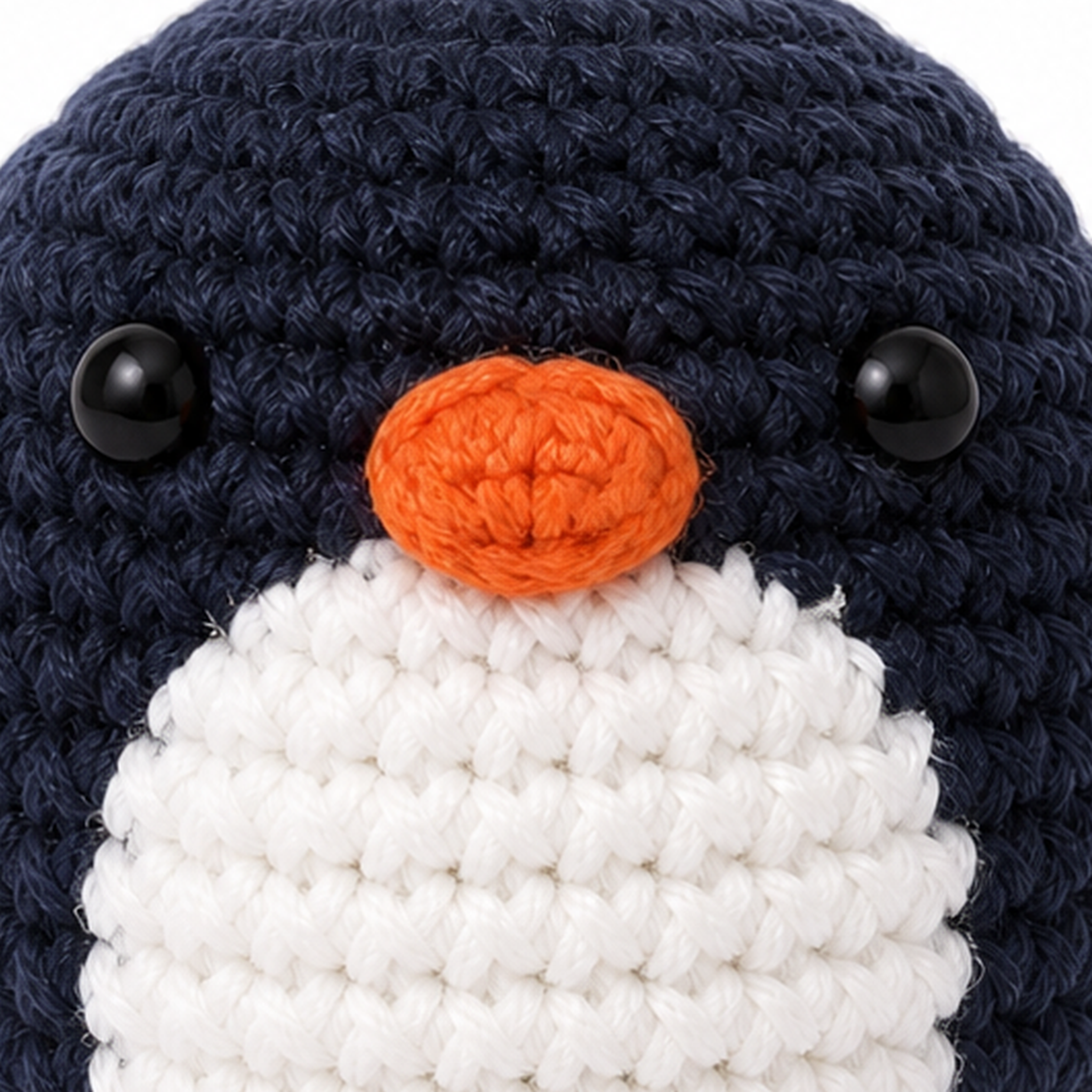 Close-up of the crochet stitches on the Penguin charm