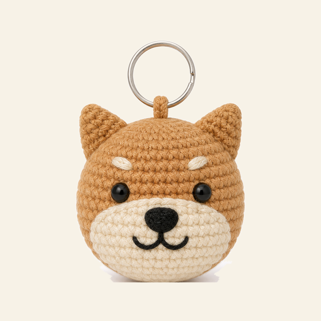 The finished crochet Shiba bag charm on its own