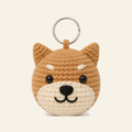 The finished crochet Shiba bag charm on its own