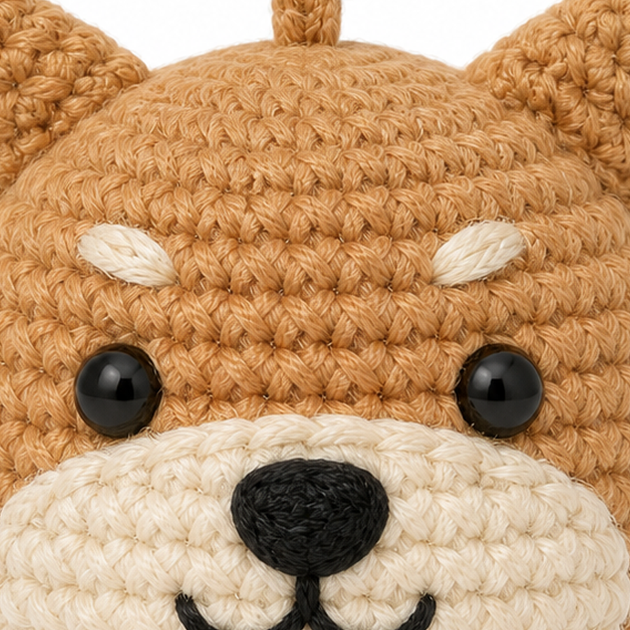 Close-up of the crochet stitches on the Shiba charm