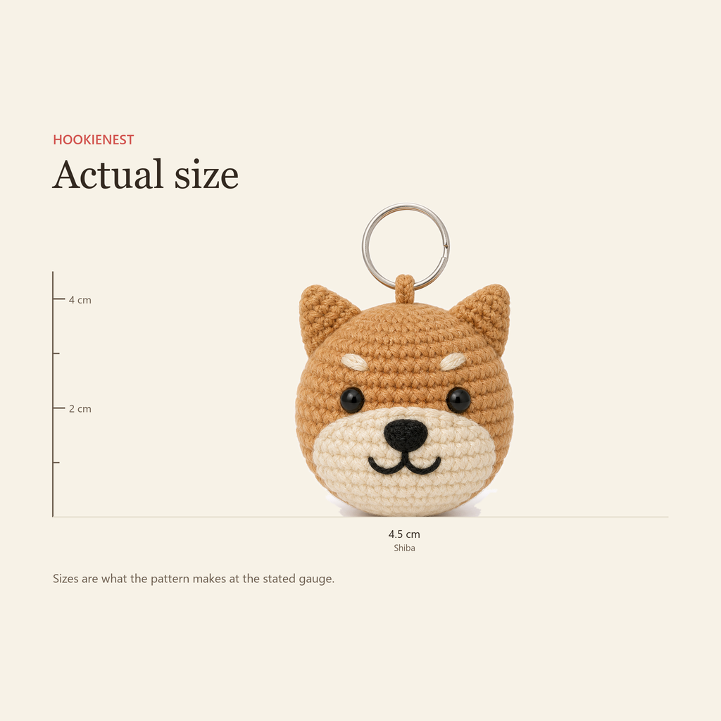 The Shiba charm beside a centimetre ruler, finishing at 4.5 cm
