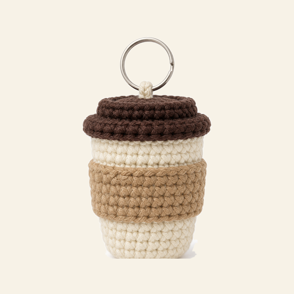 The finished crochet Coffee Cup bag charm on its own