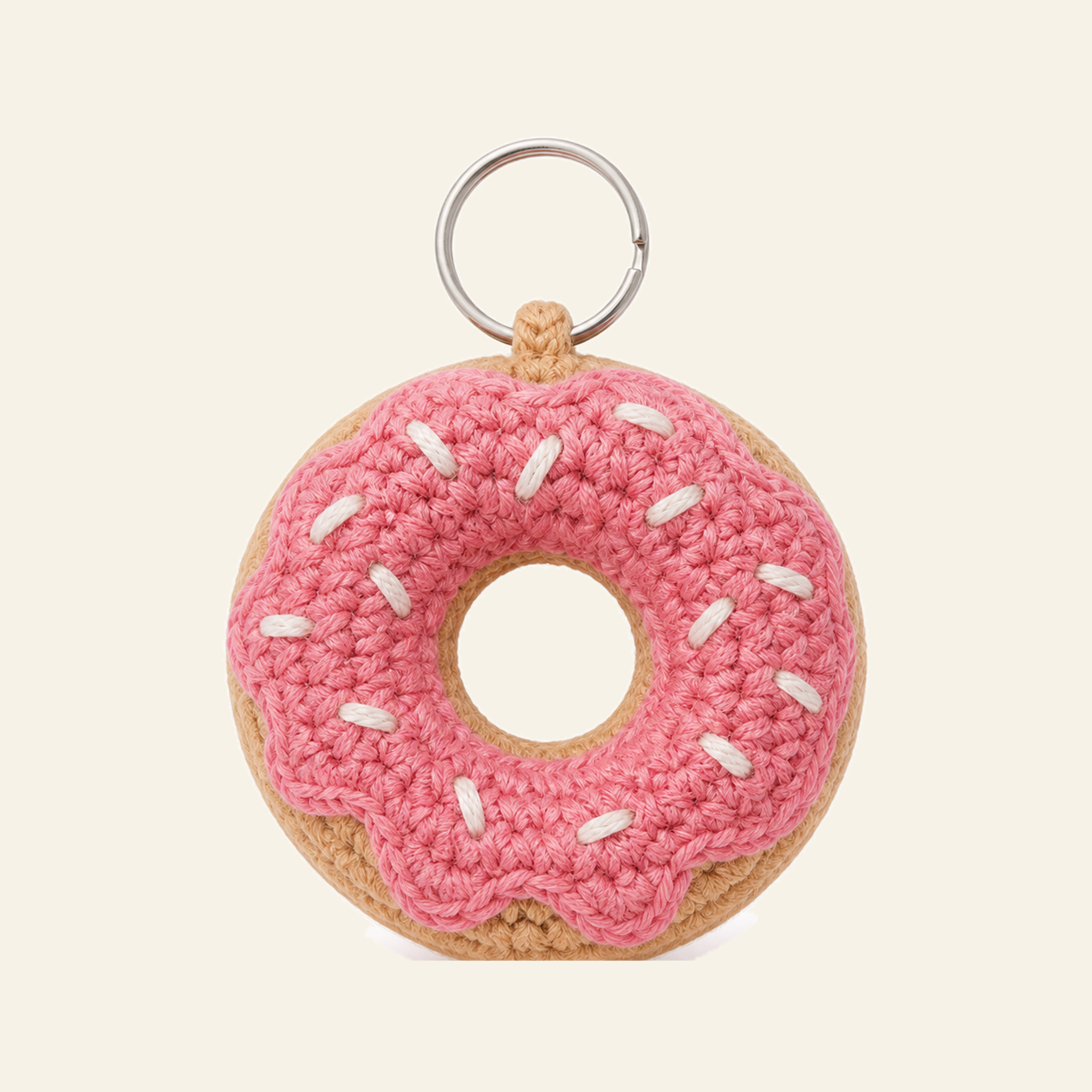The finished crochet Donut bag charm on its own