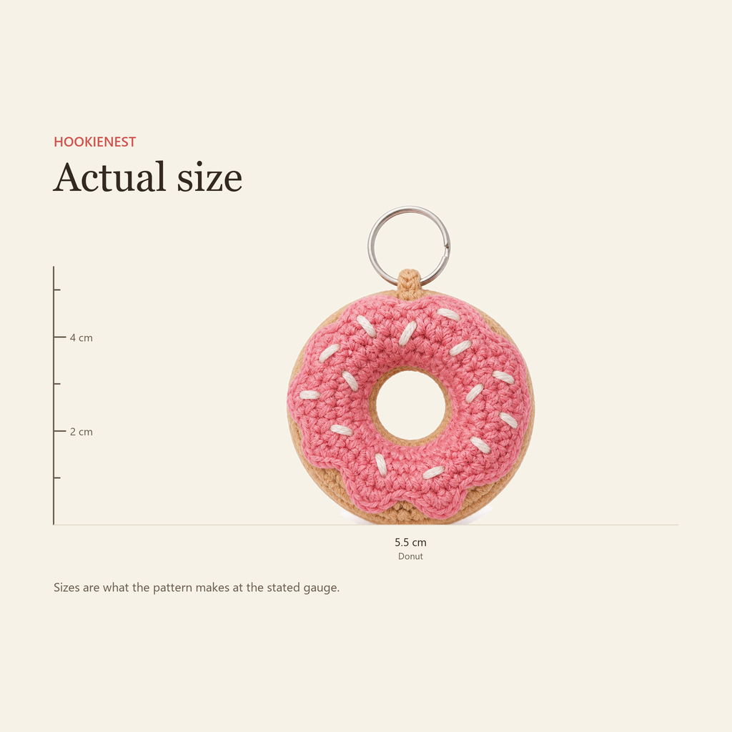 The Donut charm beside a centimetre ruler, finishing at 5.5 cm