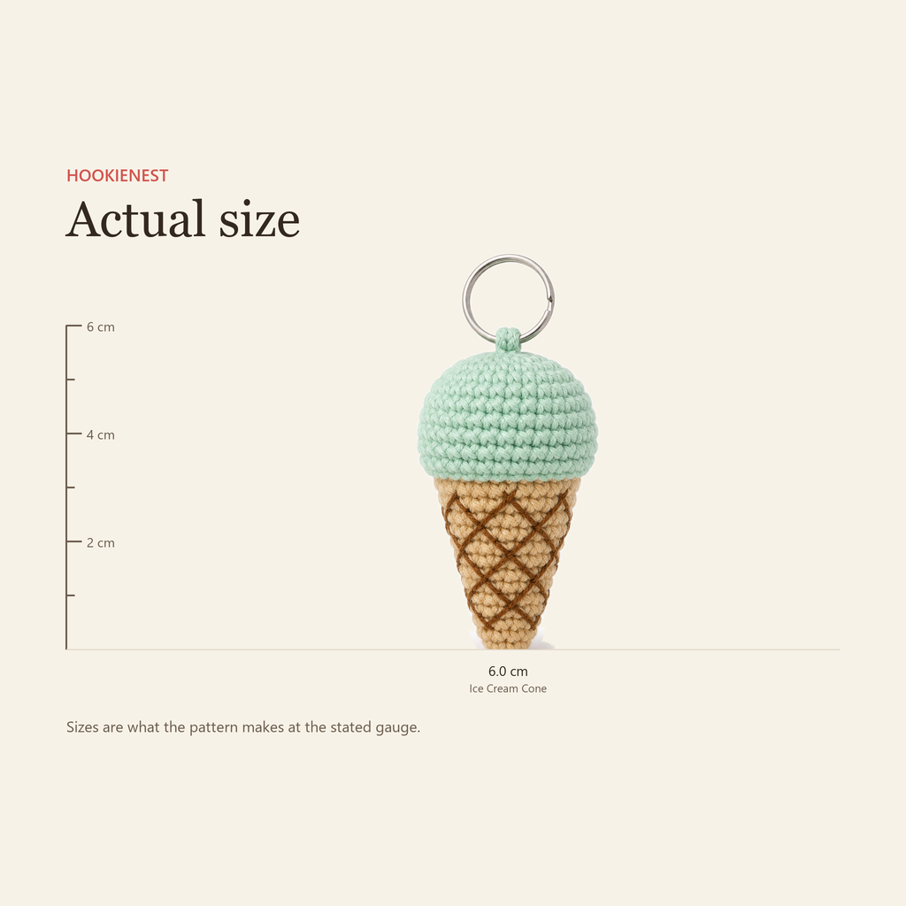 The Ice Cream Cone charm beside a centimetre ruler, finishing at 6.0 cm