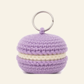 The finished crochet Macaron bag charm on its own