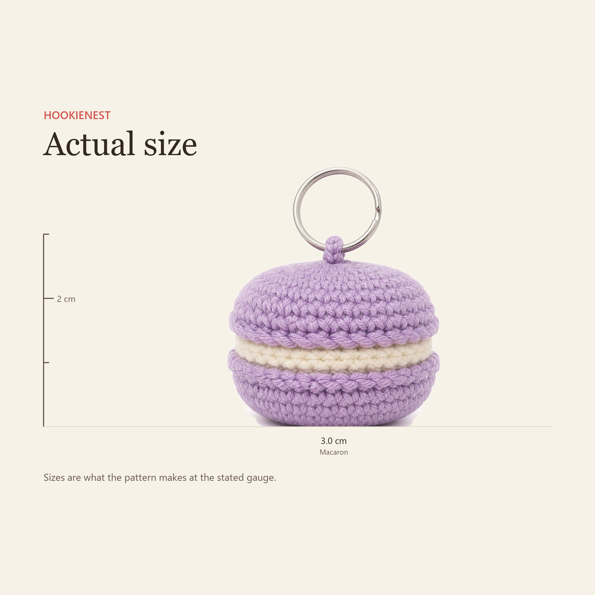 The Macaron charm beside a centimetre ruler, finishing at 3.0 cm