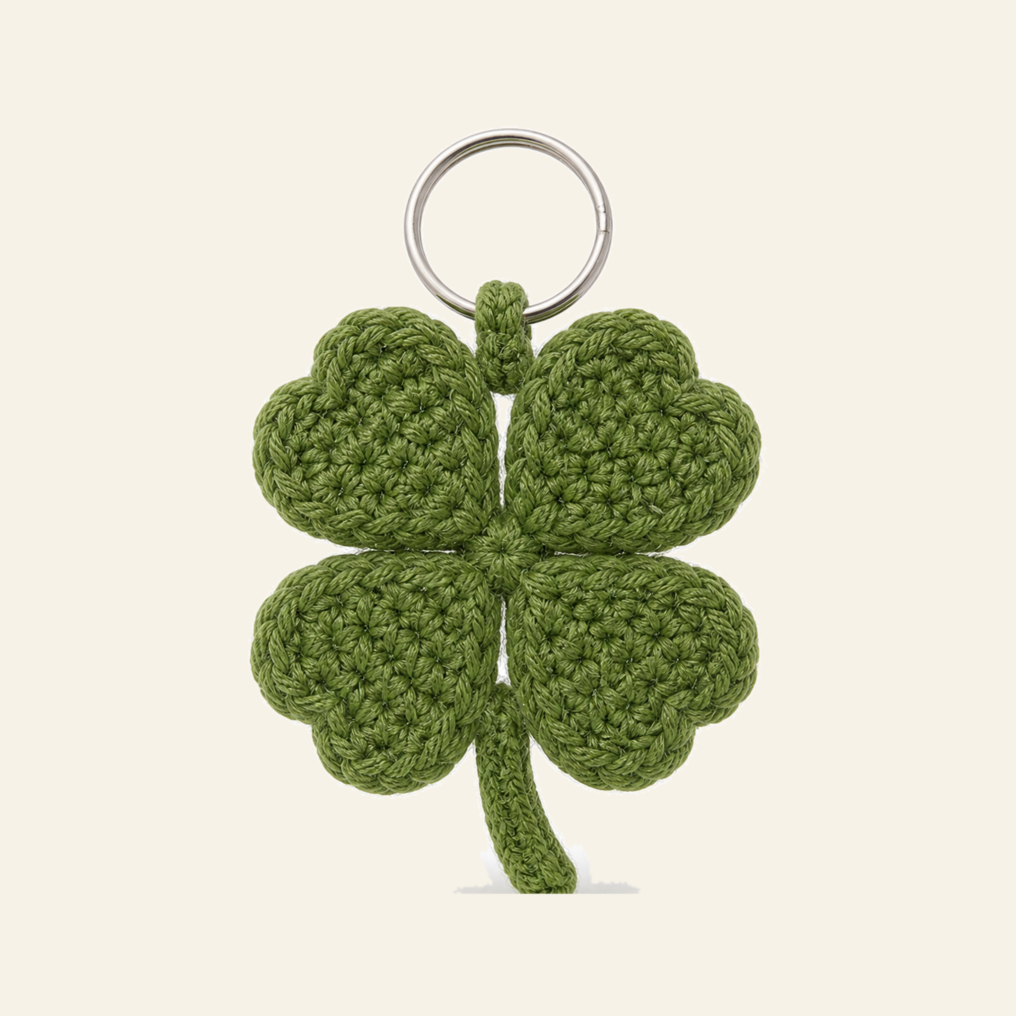 The finished crochet Four-Leaf Clover keychain on its own