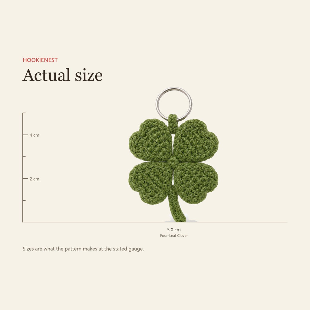 The Four-Leaf Clover keychain beside a centimetre ruler, finishing at 5.0 cm