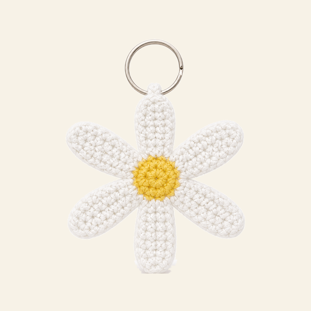 The finished crochet Daisy keychain on its own