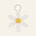 The finished crochet Daisy keychain on its own