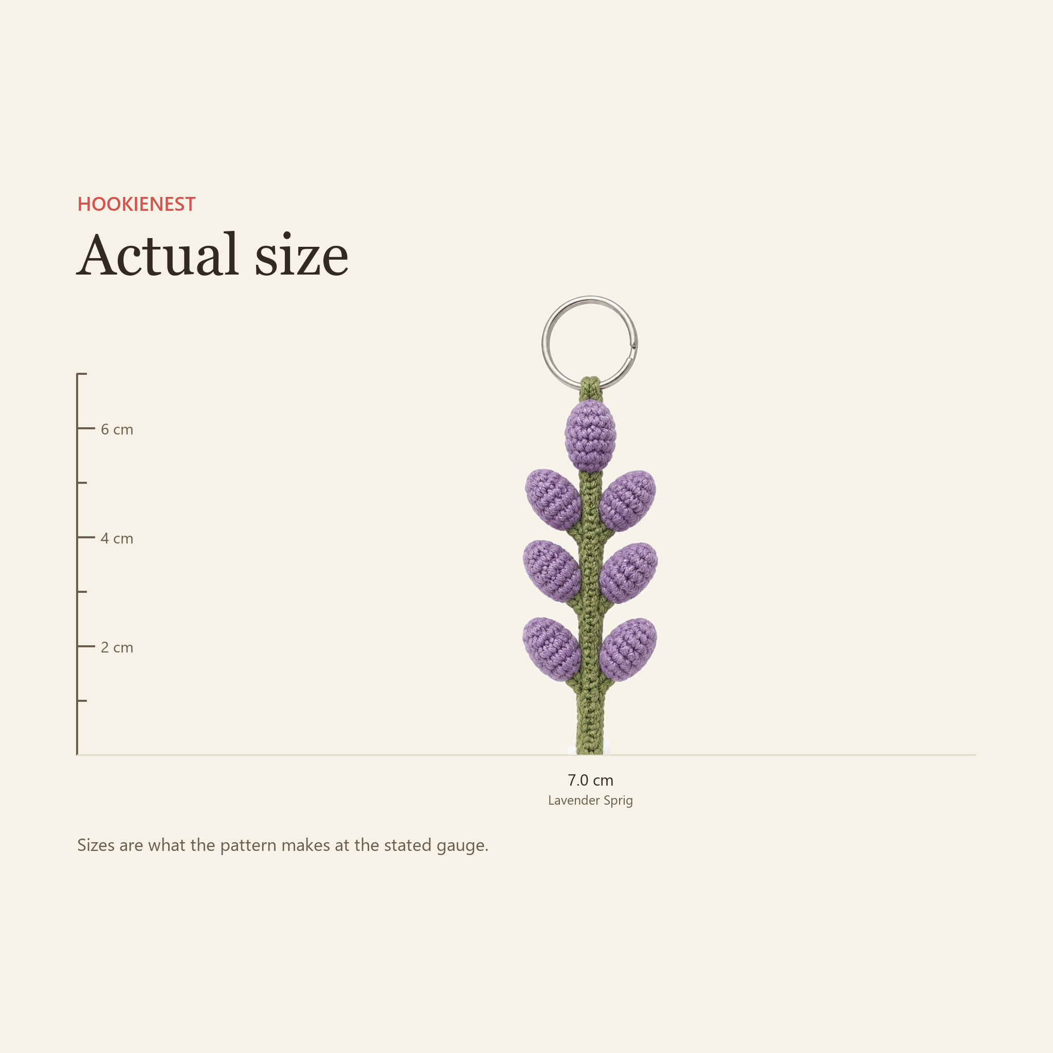 The Lavender Sprig keychain beside a centimetre ruler, finishing at 7.0 cm