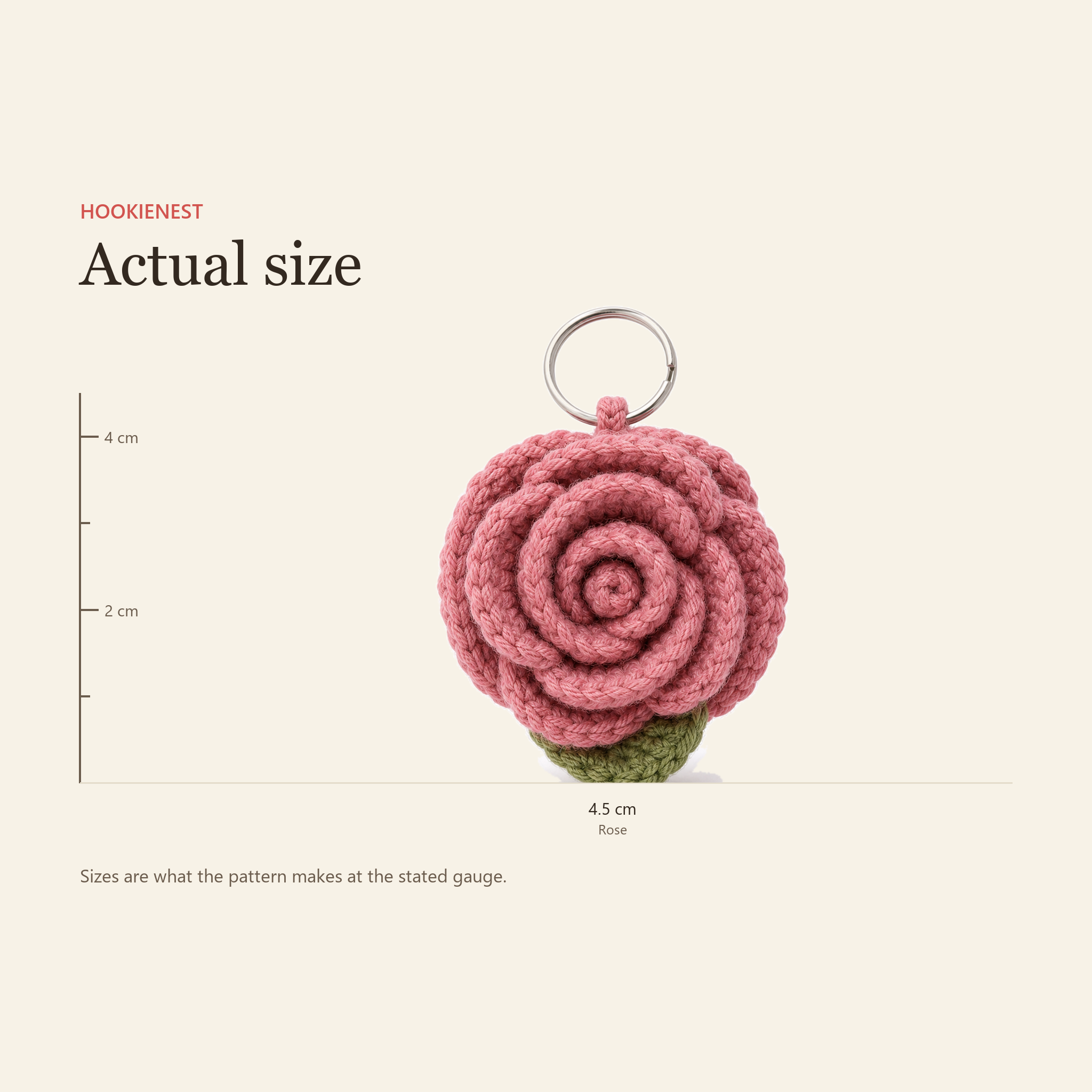 The Rose keychain beside a centimetre ruler, finishing at 4.5 cm