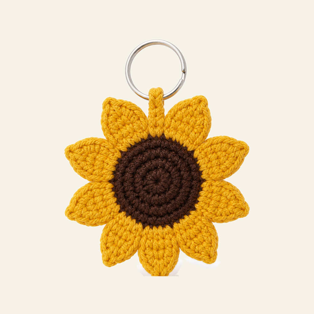 The finished crochet Sunflower keychain on its own