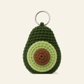 The finished crochet Avocado bag charm on its own