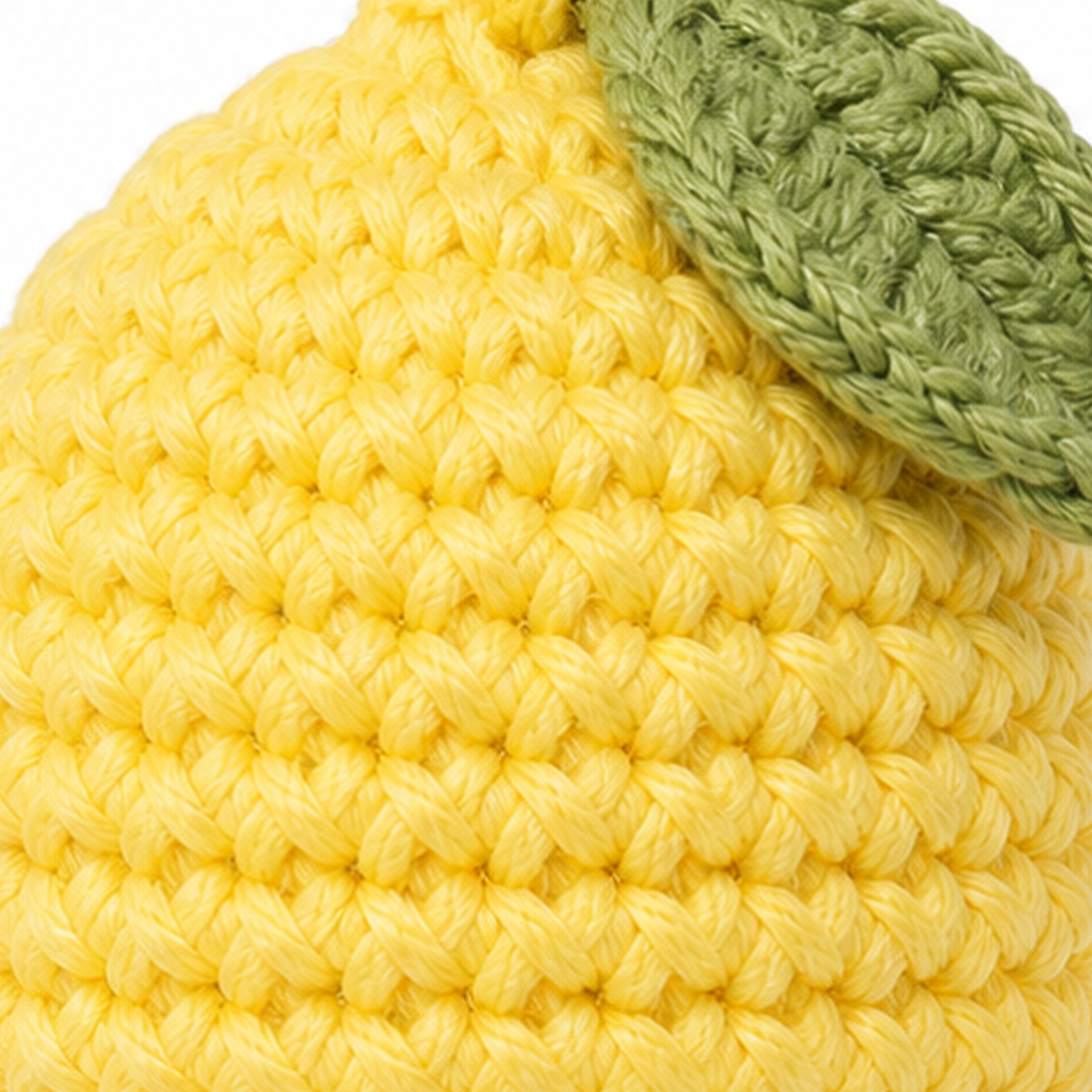Close-up of the crochet stitches on the Lemon charm