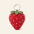 The finished crochet Strawberry bag charm on its own