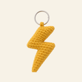 The finished crochet Lightning Bolt bag charm on its own