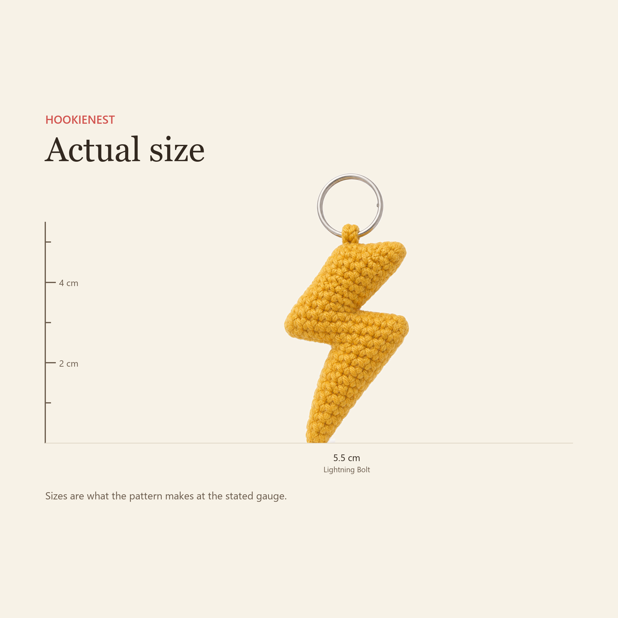 The Lightning Bolt charm beside a centimetre ruler, finishing at 5.5 cm