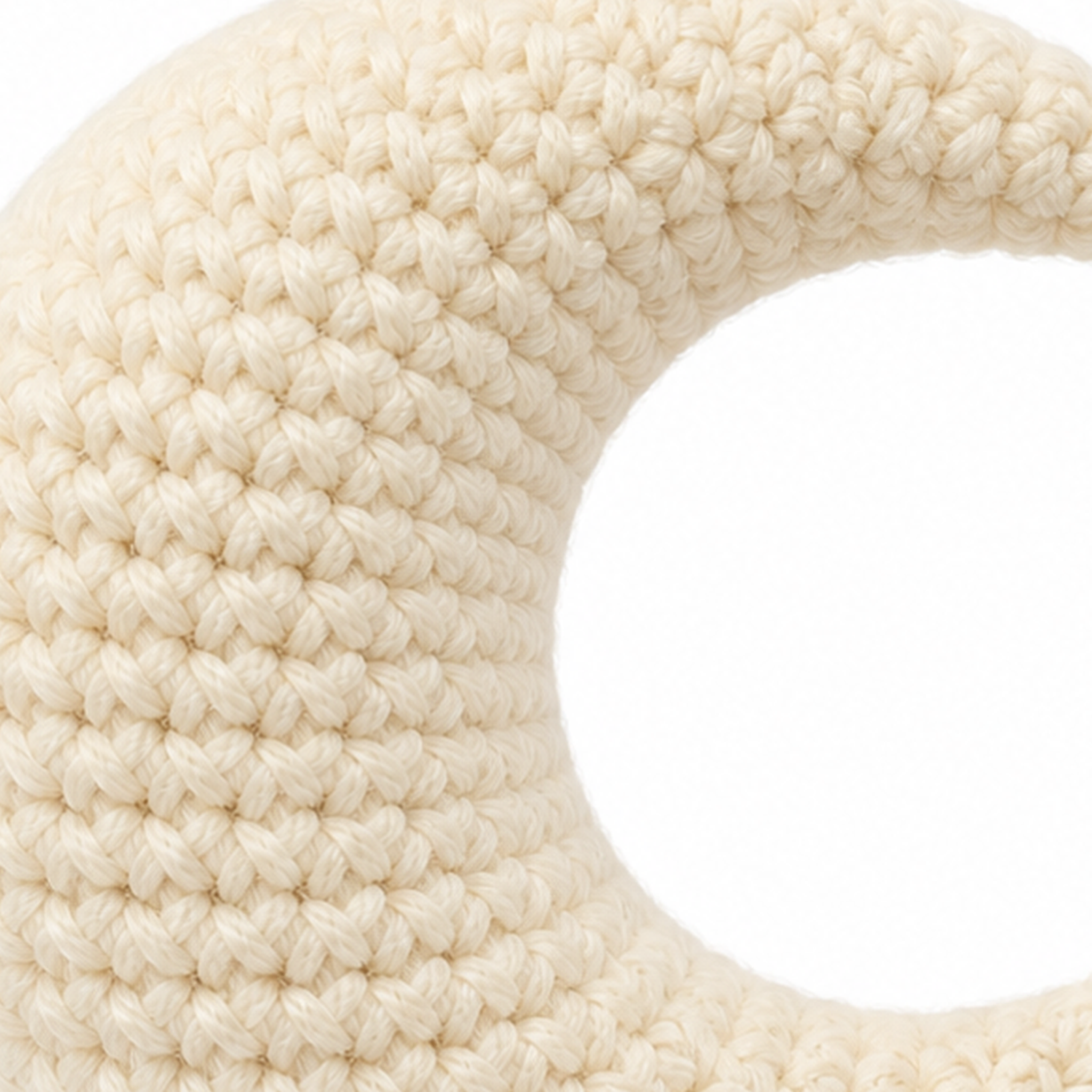 Close-up of the crochet stitches on the Crescent Moon charm