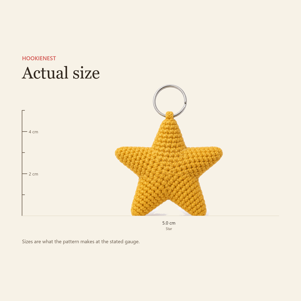The Star charm beside a centimetre ruler, finishing at 5.0 cm