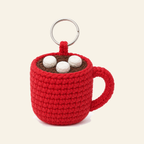 Crochet hot cocoa mug ornament in red with three white marshmallows