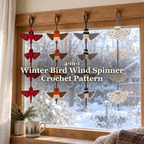 Cardinal, Robin, Chickadee and Snowy Owl crochet wind spinners hang together at a wooden window above a mug and evergreen sprigs, with the pattern title across the centre.