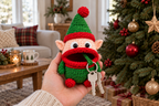 Elf Christmas crochet key pouch with an open rolled mouth, key ring and keys outside.