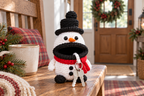 Snowman Christmas crochet key pouch with an open rolled mouth, key ring and keys outside.