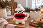 Hot Cocoa Mug Christmas crochet key pouch with an open rolled mouth, shown with the mouth empty.