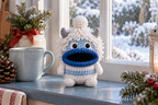 Yeti Christmas crochet key pouch with an open rolled mouth, shown with the mouth empty.